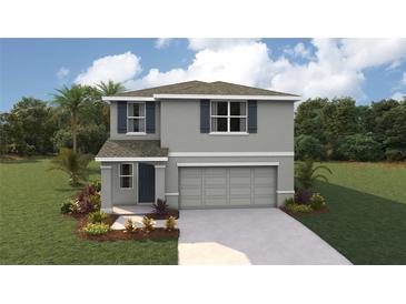 Two-story home featuring gray stucco, charming shutters, and a convenient two-car garage at 8673 Sw 44Th Ter, Ocala, FL 34476