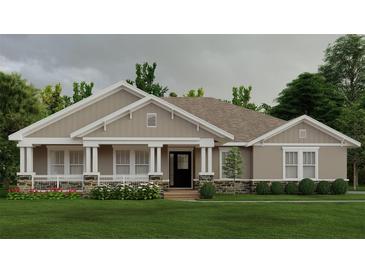 Charming single-story home featuring a welcoming front porch and stone accents for added curb appeal at 1929 Nw 85Th Loop, Ocala, FL 34475