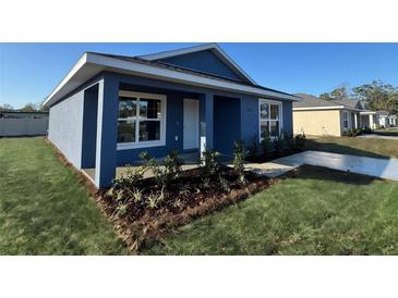 Charming home with a well-manicured front yard and inviting entrance at 6620 Se 108Th Ln, Belleview, FL 34420