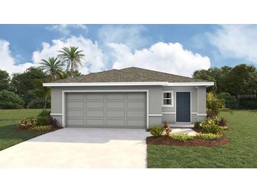 Charming single-story home with a two-car garage and landscaped front yard at 2928 Ne 21St Terrace Rd, Ocala, FL 34470