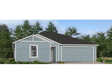 Charming one-story home with light blue siding, white trim, a gray roof, and an attached two-car garage at 4779 Nw 11Th St, Ocala, FL 34482