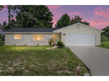 Charming single-story home boasts a well-maintained lawn and inviting curb appeal at 11153 Sw 79Th Ave, Ocala, FL 34476