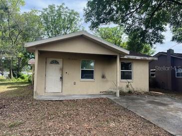 Modest single-story home featuring a simple facade, two windows, and a traditional front door at 2312 Sw Fort King St, Ocala, FL 34471
