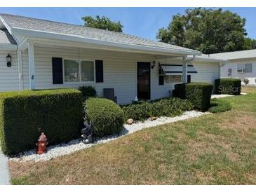 Charming single-story home featuring well-maintained landscaping and inviting curb appeal at 6512 Sw 60Th Ct, Ocala, FL 34474