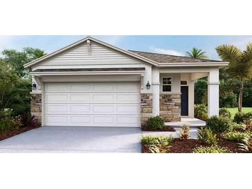 Charming single-story home showcasing a neutral color palette, stone accents, and well-maintained landscaping at 8582 Pinecrest Trl, Wildwood, FL 34785