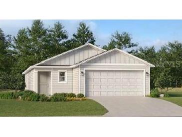 Charming single-story home features a two-car garage, well-maintained lawn, and neutral siding at 1142 Nw 47Th Ct, Ocala, FL 34482