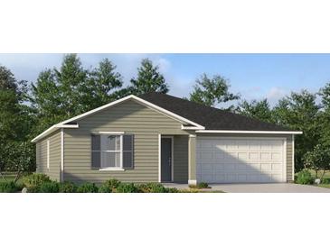 Charming single-story home featuring a two-car garage, well-kept lawn, and inviting curb appeal at 4636 Sw 84Th Street Rd, Ocala, FL 34476