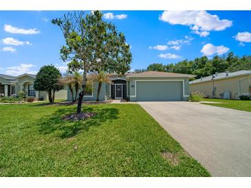 Charming one-story home with lush front lawn and a well-maintained driveway at 16193 Sw 14Th Avenue Rd, Ocala, FL 34473