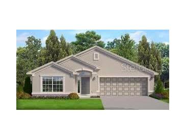 Charming one-story home with a two-car garage, manicured lawn, and mature landscaping at 3203 Ne 46Th Ave, Ocala, FL 34470