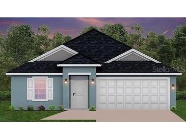 Charming single-story home with a two-car garage and a well-maintained lawn at dusk at 4651 Ne 32Nd Pl, Ocala, FL 34470
