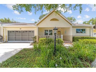 Charming single-story home with a well-maintained lawn and welcoming front porch at 9085 Sw 96Th Ln # B, Ocala, FL 34481