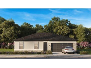 Charming one-story home with a two-car garage, stone accents, and professional landscaping at 6859 Sw 128Th Pl, Ocala, FL 34473