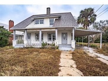 Charming two-story house with a covered porch at 520 S 10Th St, Lake Wales, FL 33853
