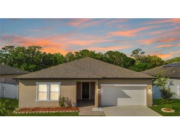Charming one-story home featuring a well-maintained lawn and inviting curb appeal at 4924 Saint James St, Winter Haven, FL 33881