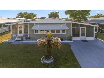 Charming single-story home with a well-maintained lawn and inviting curb appeal, perfect for a relaxed lifestyle at 4940 Foxdale Dr, Lakeland, FL 33810