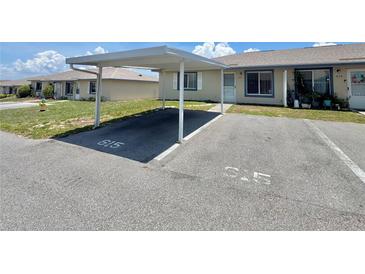 Charming condo with dedicated covered parking space, and well-maintained landscaping at 615 Ridge Ter # 615, Winter Haven, FL 33881