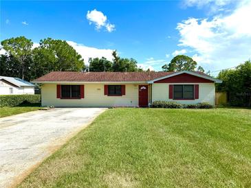 Charming single-story home featuring a well-maintained lawn and a classic concrete driveway at 2159 Greenway Dr, Winter Haven, FL 33881