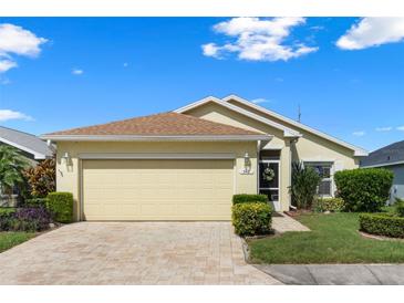 Charming one-story home with a well-manicured lawn and inviting curb appeal at 348 Lake Suzanne Dr, Lake Wales, FL 33859