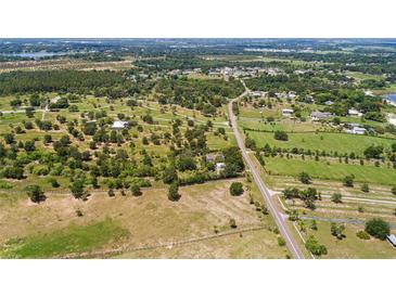 Spacious property featuring mature trees and multiple building locations at 836 S Lake Starr Blvd, Lake Wales, FL 33898