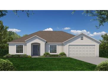 Charming single-story home featuring a well-maintained lawn, a two-car garage and a classic, neutral color scheme at 131 W 6Th St, Frostproof, FL 33843