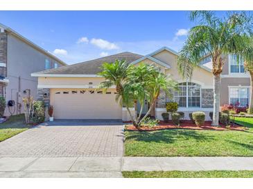 Charming single-Gathering home with well-maintained landscaping and a two-car garage at 1333 Darnaby Way, Orlando, FL 32824