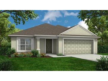 Charming one-story home featuring a two-car garage, well-manicured lawn, and a welcoming front entrance at 3708 Dixi Trl, Bartow, FL 33830