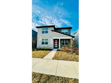 Two-story home with modern facade and landscaping at 11926 Sunsail Ave, Orlando, FL 32832