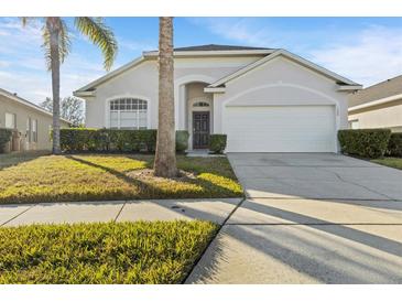 One-story house with a two-car garage and well-manicured lawn at 1739 Morning Star Dr, Clermont, FL 34714