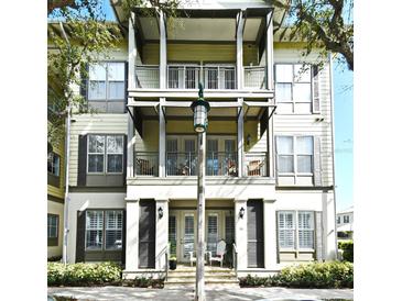Attractive 3-story building with balconies and a charming entrance at 601 Sycamore St # 6108, Celebration, FL 34747