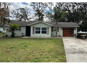Charming ranch home with updated exterior and landscaping at 14636 Bray Rd, Orlando, FL 32832