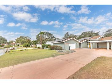 House with solar panels and RV parking at 109 Arrowhead Ln, Haines City, FL 33844