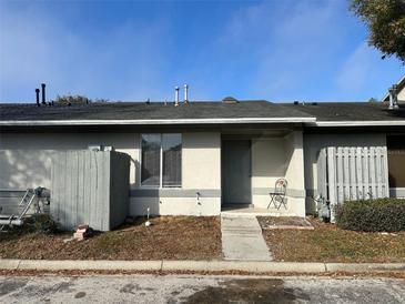 Charming single-story home featuring neutral tones, large windows and low maintenance landscaping at 1324 Eagle Ln, Winter Garden, FL 34787