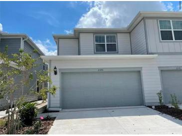 Charming two-story home with a well-maintained lawn and a two-car garage in a desirable neighborhood at 2595 Buena View Dr, Kissimmee, FL 34746