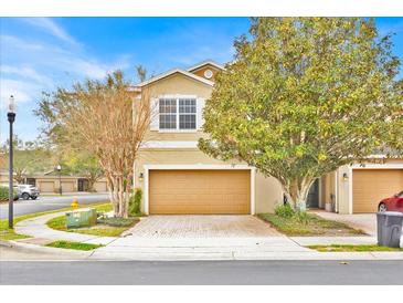 Charming two-story home with an attached garage and beautiful trees in a well-maintained neighborhood at 1518 Orrington Payne Pl, Casselberry, FL 32707