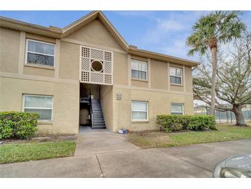 Charming condo featuring a neutral color scheme and a well-maintained exterior at 2416 Swailes Dr # 8, Orlando, FL 32837