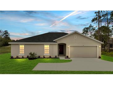 Charming single-story home featuring a two-car garage, well-maintained lawn, and neutral stucco exterior at 43 Peterlee Ct, Kissimmee, FL 34758