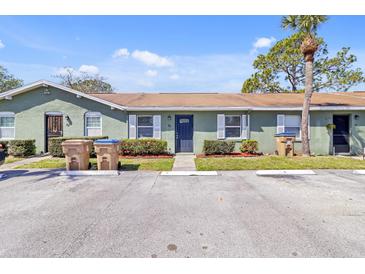 Charming one-story home with well-maintained landscaping and parking at 30 Las Palmas Way, Kissimmee, FL 34743