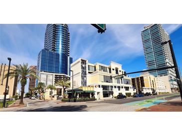 Metropolitan building street view showcasing modern architecture and convenient street access at 151 E Washington St # 327, Orlando, FL 32801