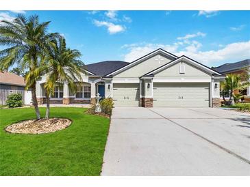 Charming single-story home featuring a well-manicured lawn and a two-car garage at 784 Seneca Trl, St Cloud, FL 34772
