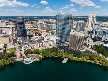 Breathtaking aerial view of downtown Orlando, showcasing high-rise buildings and the iconic Lake Eola at 150 E Robinson St # 219, Orlando, FL 32801