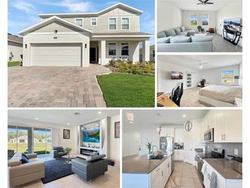 Beautiful two-story home with well-maintained landscaping and a brick-paved driveway leading to a spacious garage at 4623 Wandsworth Way, Davenport, FL 33837