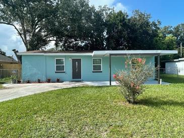 Charming home with well-manicured front yard and a carport at 5017 Steyr St, Orlando, FL 32819