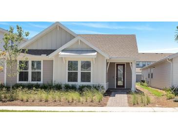 Charming single-story home with neutral paint, tidy landscaping, and a welcoming front entrance at 6494 Rover Way, St Cloud, FL 34771