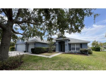Charming single-story home with well-maintained landscaping and inviting curb appeal at 3638 Doe Run Dr, St Cloud, FL 34772