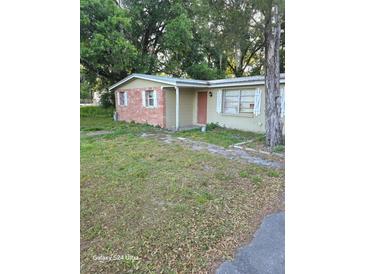 Cozy single-story home with mixed facade and mature trees in a quaint neighborhood at 7511 Us Highway 98 N, Lakeland, FL 33809
