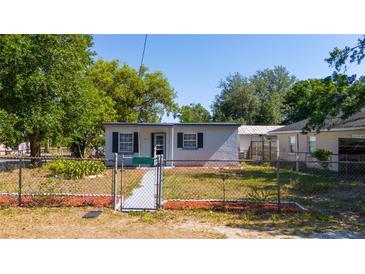 Charming single-story home with a fenced yard, offering a cozy and secure living space at 1814 Leroy Dr, Haines City, FL 33844