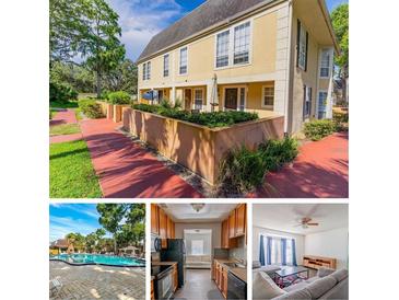 Inviting two-story townhome featuring a well-maintained exterior and charming landscaping at 4017 Dijon Dr # 4017K, Orlando, FL 32808