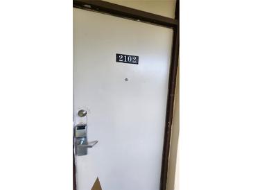 Unit 2102 features a secure entrance at 7900 S Orange Blossom Trl # 2102, Orlando, FL 32809
