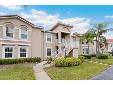 Charming condo with tile roof, private entrance and well-maintained landscaping at 2832 Osprey Cove Pl # 102, Kissimmee, FL 34746