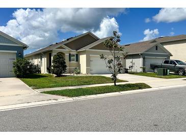 Charming single-Gathering home featuring a well-manicured lawn and inviting curb appeal in a desirable neighborhood at 2727 Harmonia Hammock Rd, Harmony, FL 34773